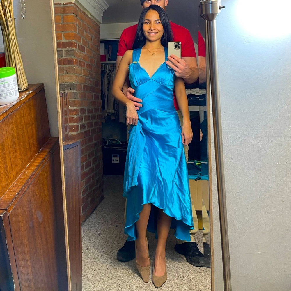 Fancy dress evening gown in turquoise color
